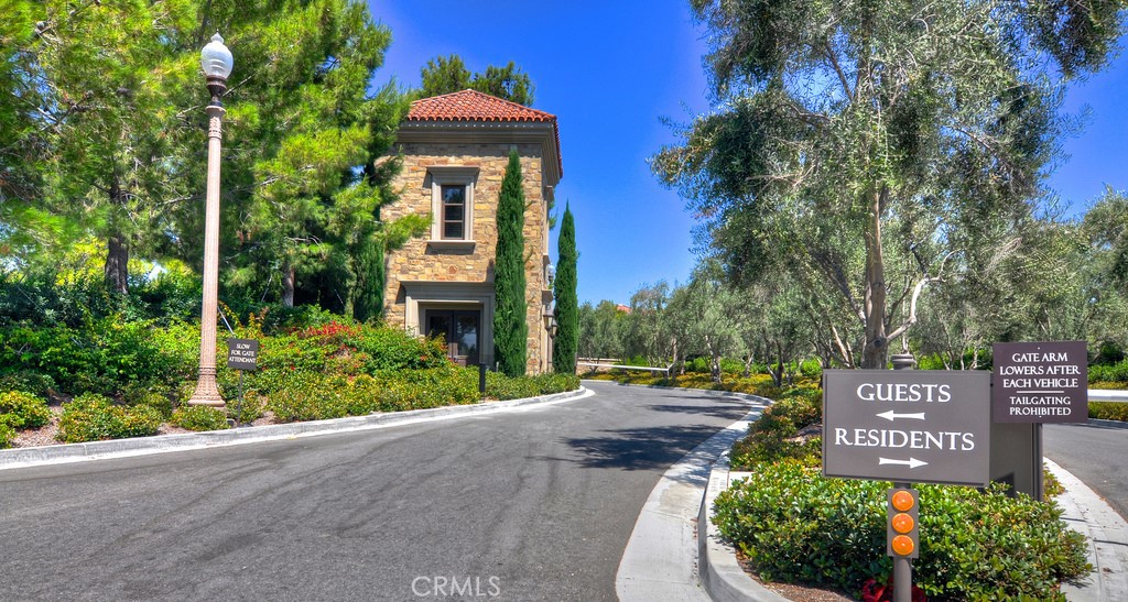 58 Lupari Irvine, CA 92618 - Photo 28 of 60 a sign board with a house and garden space