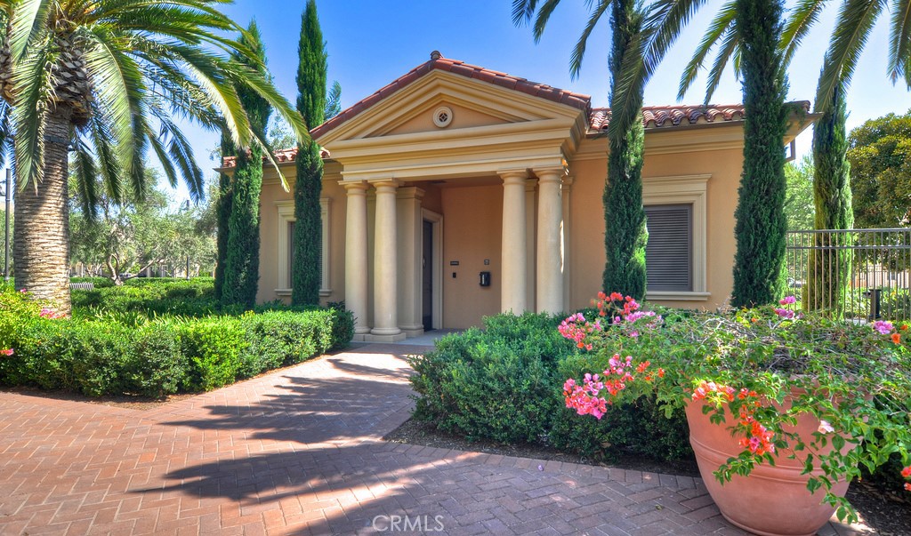 58 Lupari Irvine, CA 92618 - Photo 35 of 60 a front view of a house with a garden
