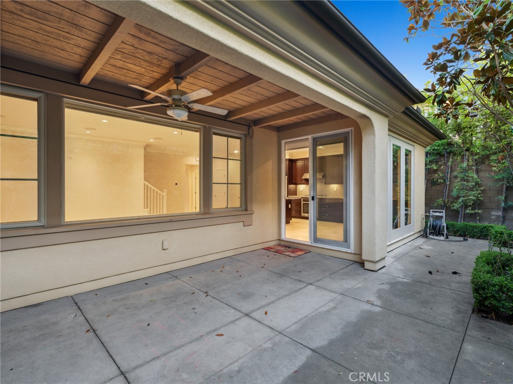 58 Lupari Irvine, CA 92618 - Photo 9 of 60 a view of an empty room with a window and potted plants