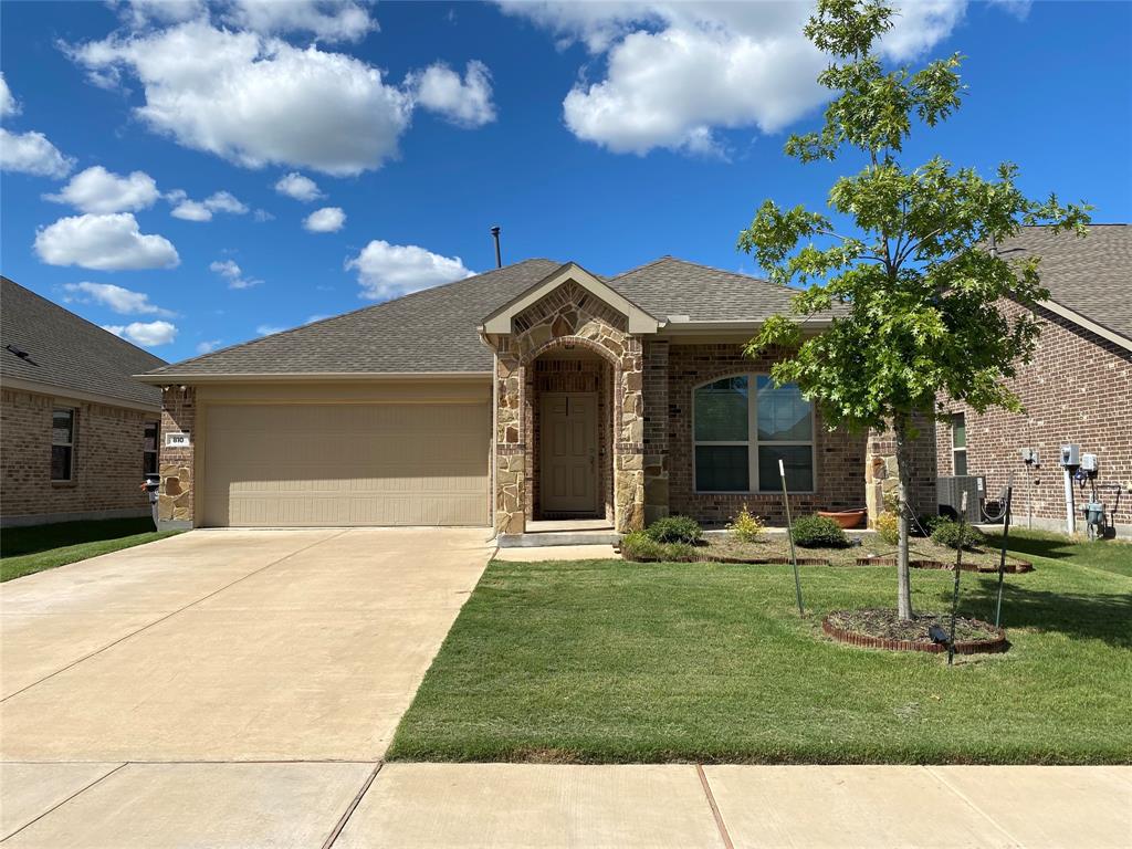 810 Silverbell Street Princeton, TX 75407 - Photo 1 of 1 a front view of a house with garden