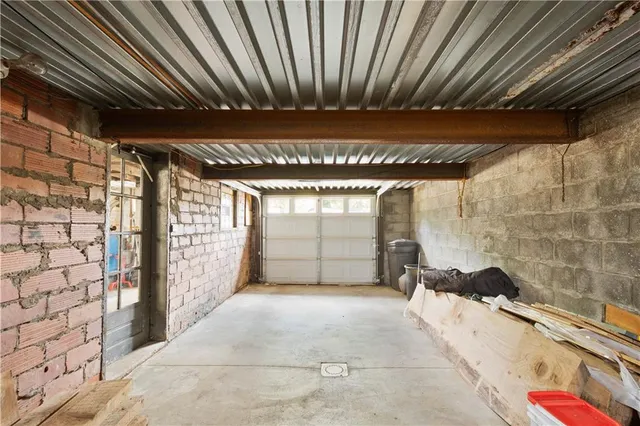 a view of a room with windows