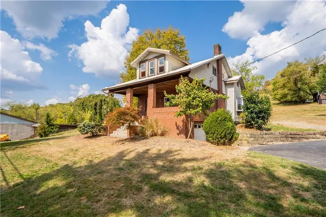 a view of a house with a patio