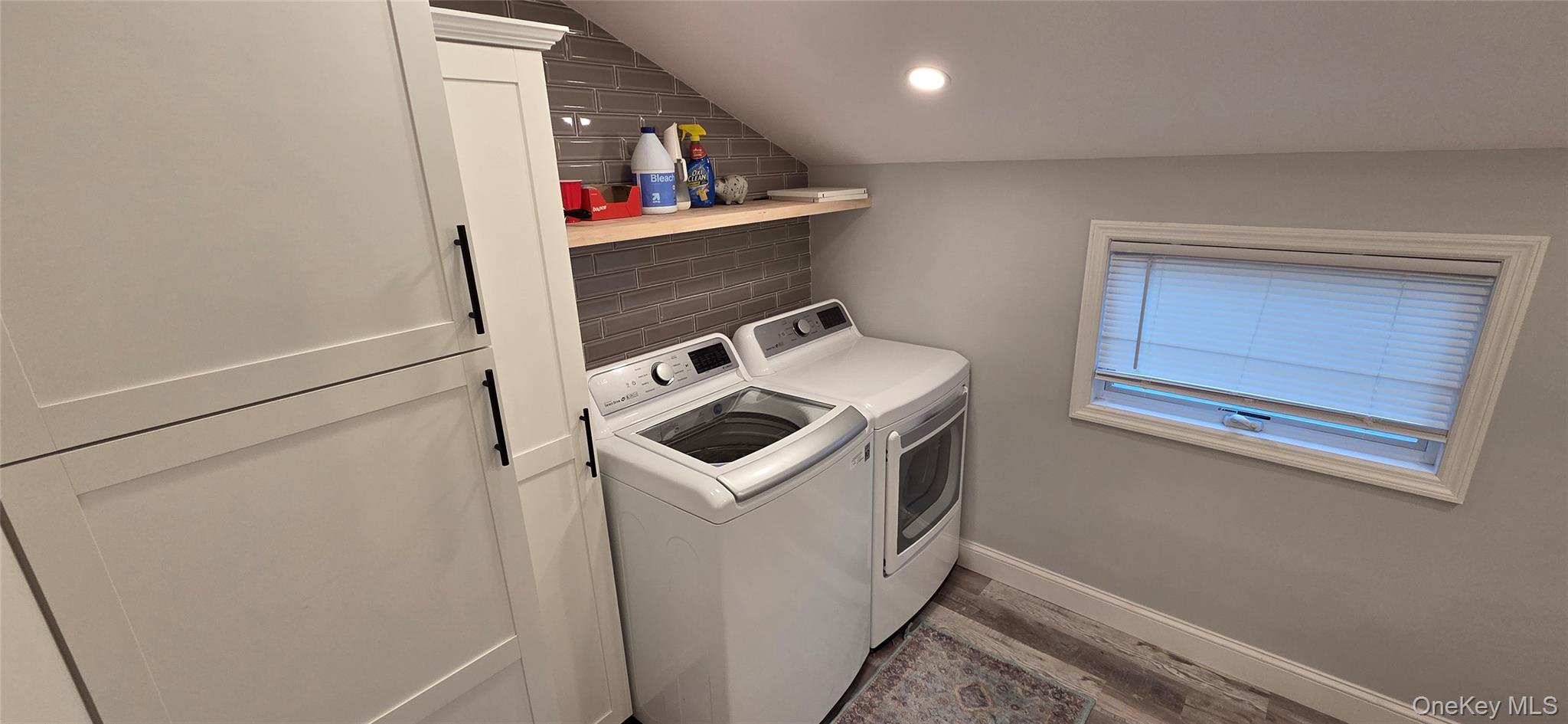 522 Moriches Road St. James, NY 11780 - Photo 18 of 49 a storage room with washer and dryer