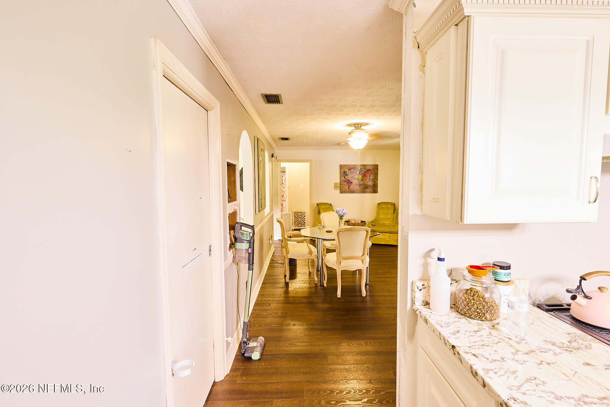 8965 San Rae Road Jacksonville, FL 32257 - Photo 25 of 46 a view of a kitchen with dining table and chairs