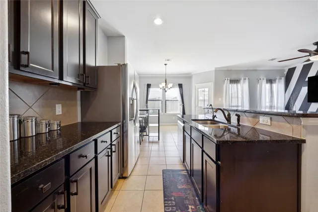 a view of storage and utility room with washer and dryer