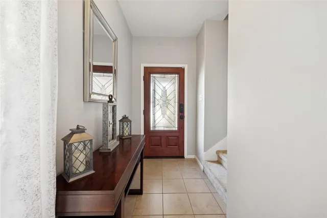 a bathroom with a sink toilet and a mirror