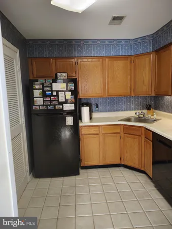 a view of a room with a door and chair