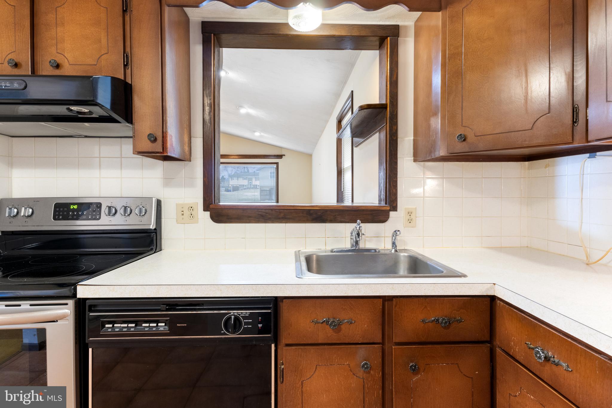 2266 Sycamore Road York, PA 17408 - Photo 15 of 43 a kitchen with a sink and a stove