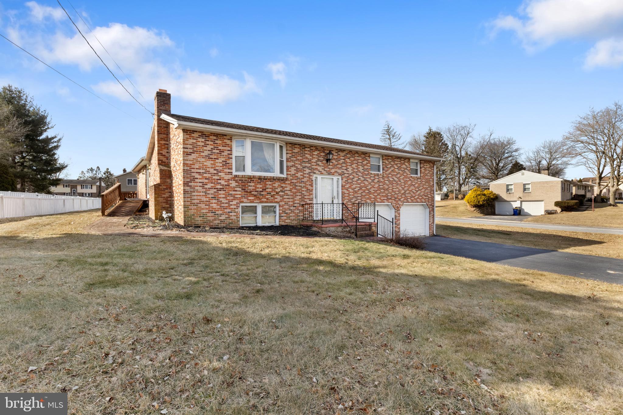 2266 Sycamore Road York, PA 17408 - Photo 2 of 43 a view of a house with a yard