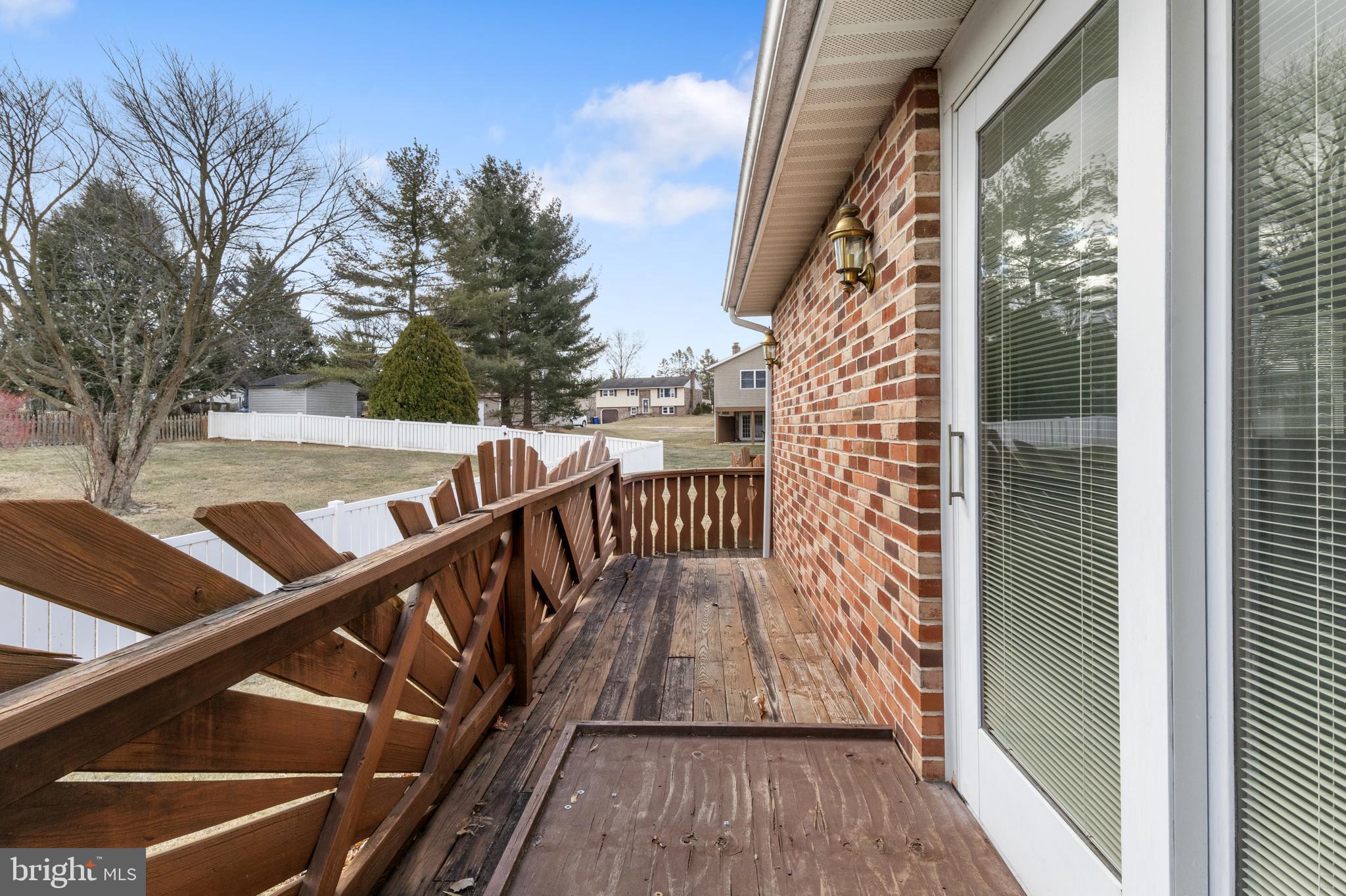 2266 Sycamore Road York, PA 17408 - Photo 34 of 43 a view of balcony with wooden floor and fence