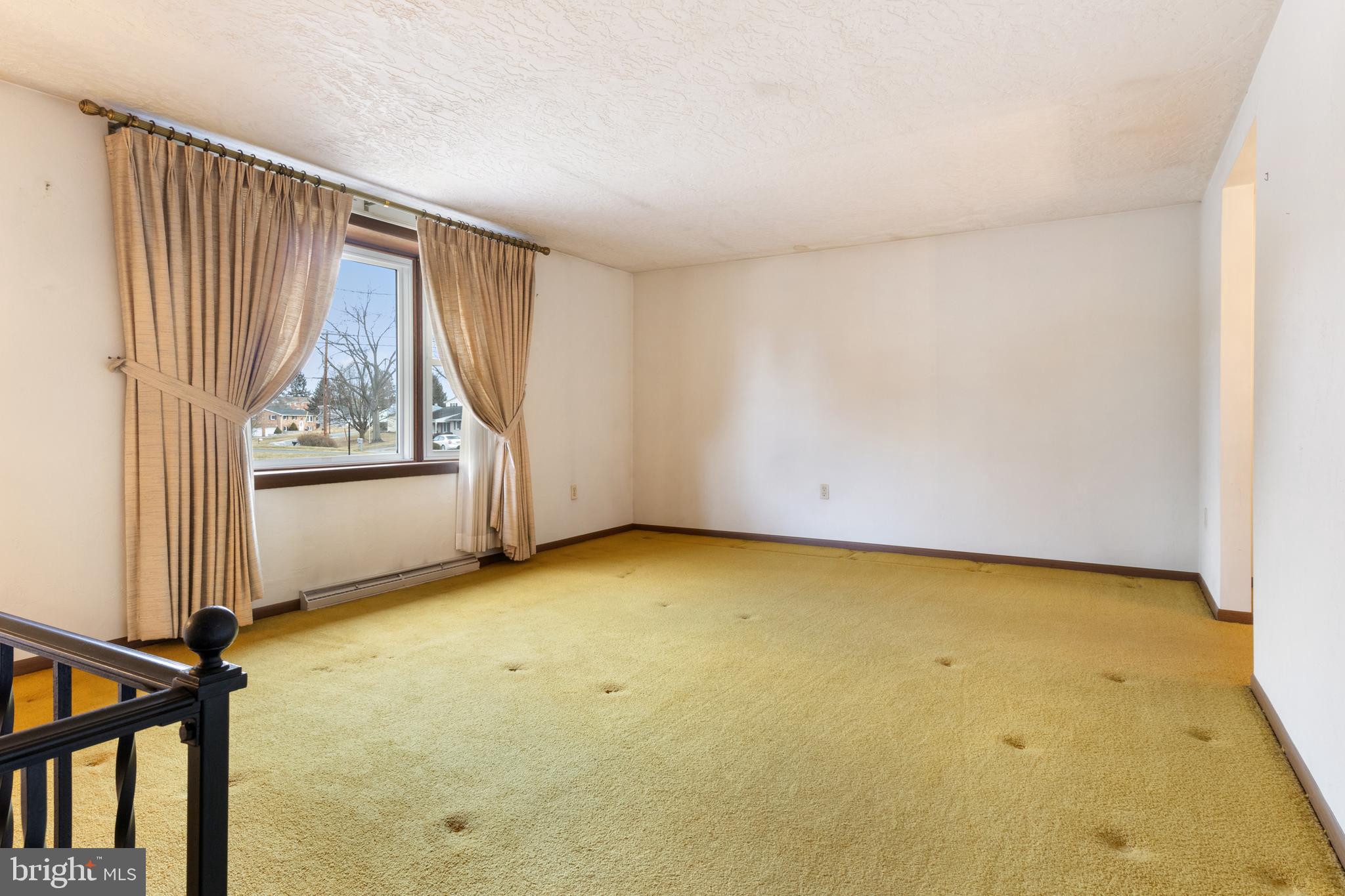 2266 Sycamore Road York, PA 17408 - Photo 6 of 43 a view of an empty room with a window