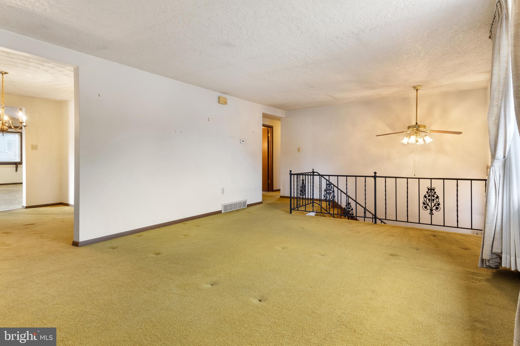 2266 Sycamore Road York, PA 17408 - Photo 7 of 43 an empty room with stairs