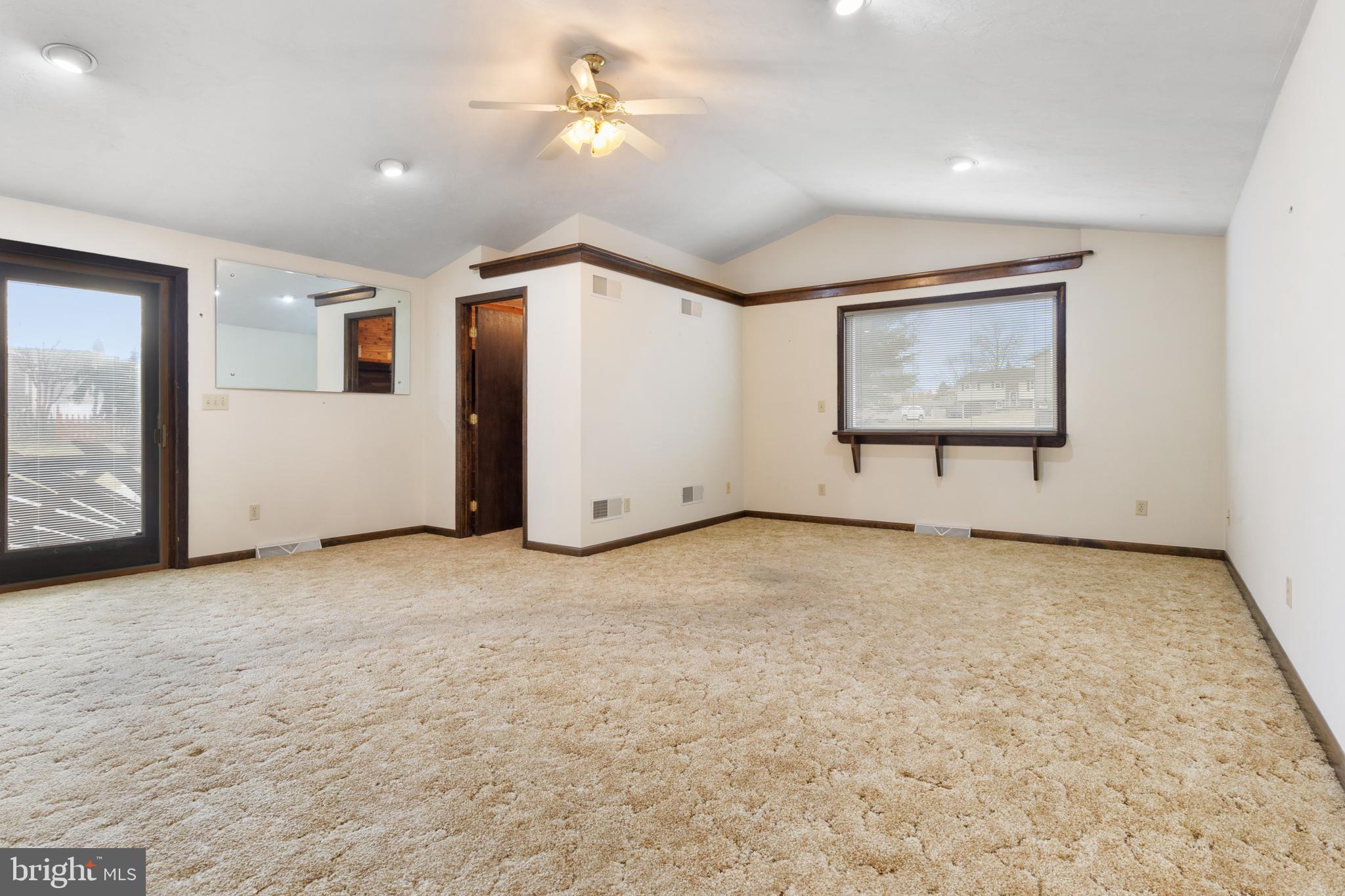 2266 Sycamore Road York, PA 17408 - Photo 10 of 43 an empty room with windows and fan