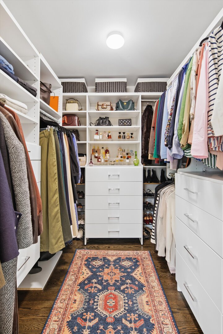 2222 North Racine Avenue, Unit 16 Chicago, IL 60614 - Photo 29 of 32 a view of walk in closet with clothes and shoes