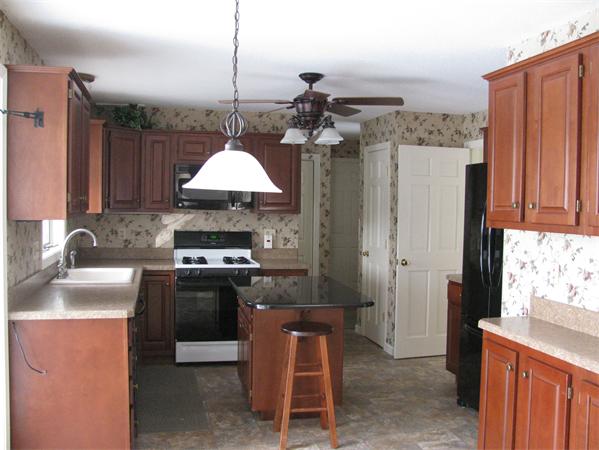28 Red Bridge Road Wilbraham, MA 01095 - Photo 3 of 26 a kitchen with stainless steel appliances granite countertop a sink stove and refrigerator