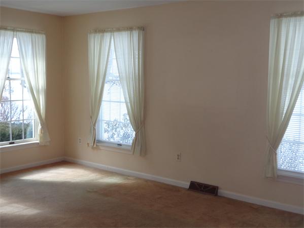 28 Red Bridge Road Wilbraham, MA 01095 - Photo 6 of 26 an empty room with windows