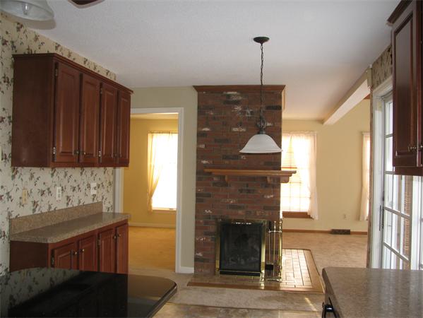 28 Red Bridge Road Wilbraham, MA 01095 - Photo 9 of 26 a living room with furniture and a fireplace