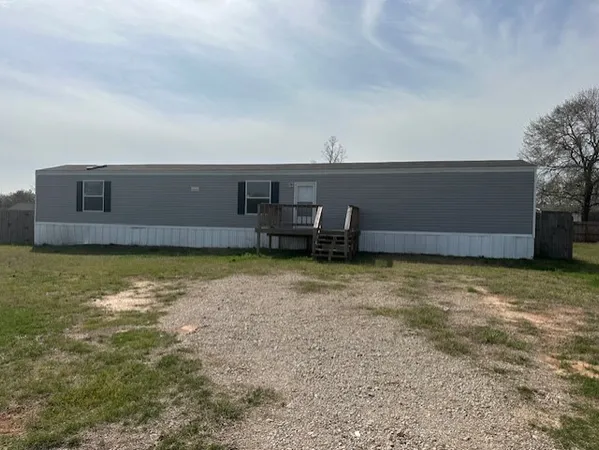 a view of swimming pool with outdoor seating