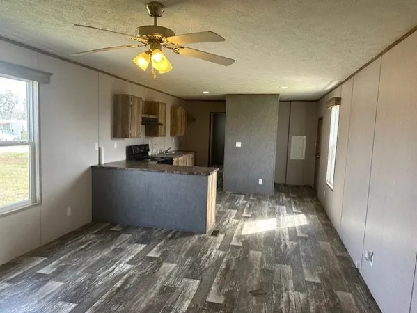a view of kitchen with window and outdoor space