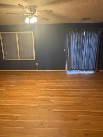 a bathroom with a toilet a sink and shower