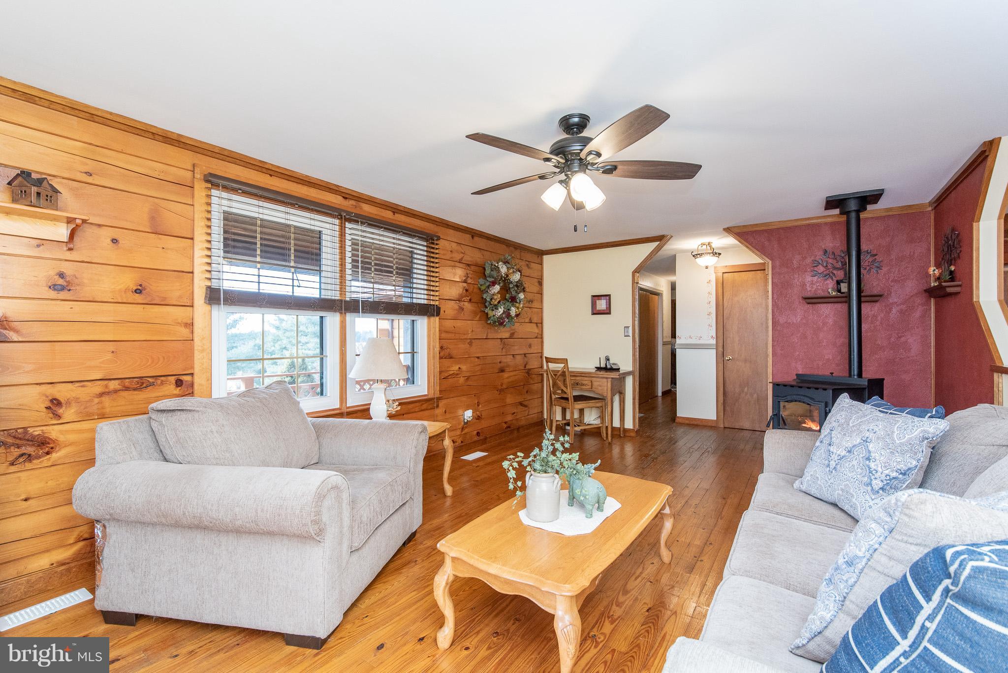 5375 Rocks Road Pylesville, MD 21132 - Photo 5 of 50 Living Room with a Pellet Stove