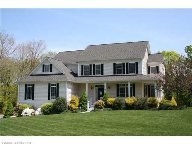 49 Brookfield Road Seymour, CT 06483 - Photo 1 of 1 a front view of a house with a yard