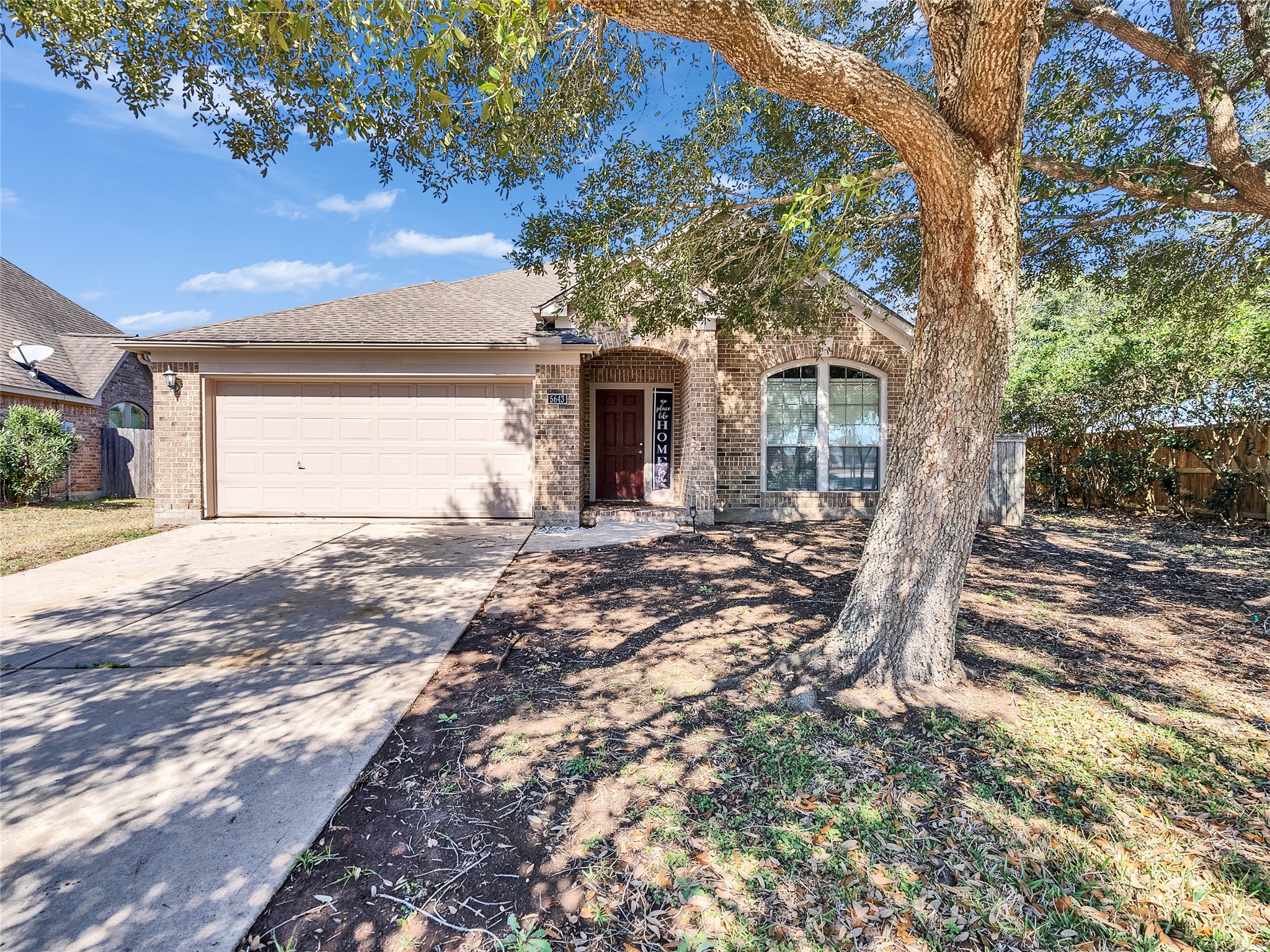 5643 Walnut Glen Lane Rosenberg, TX 77471 - Photo 4 of 42 a view of a house with a yard