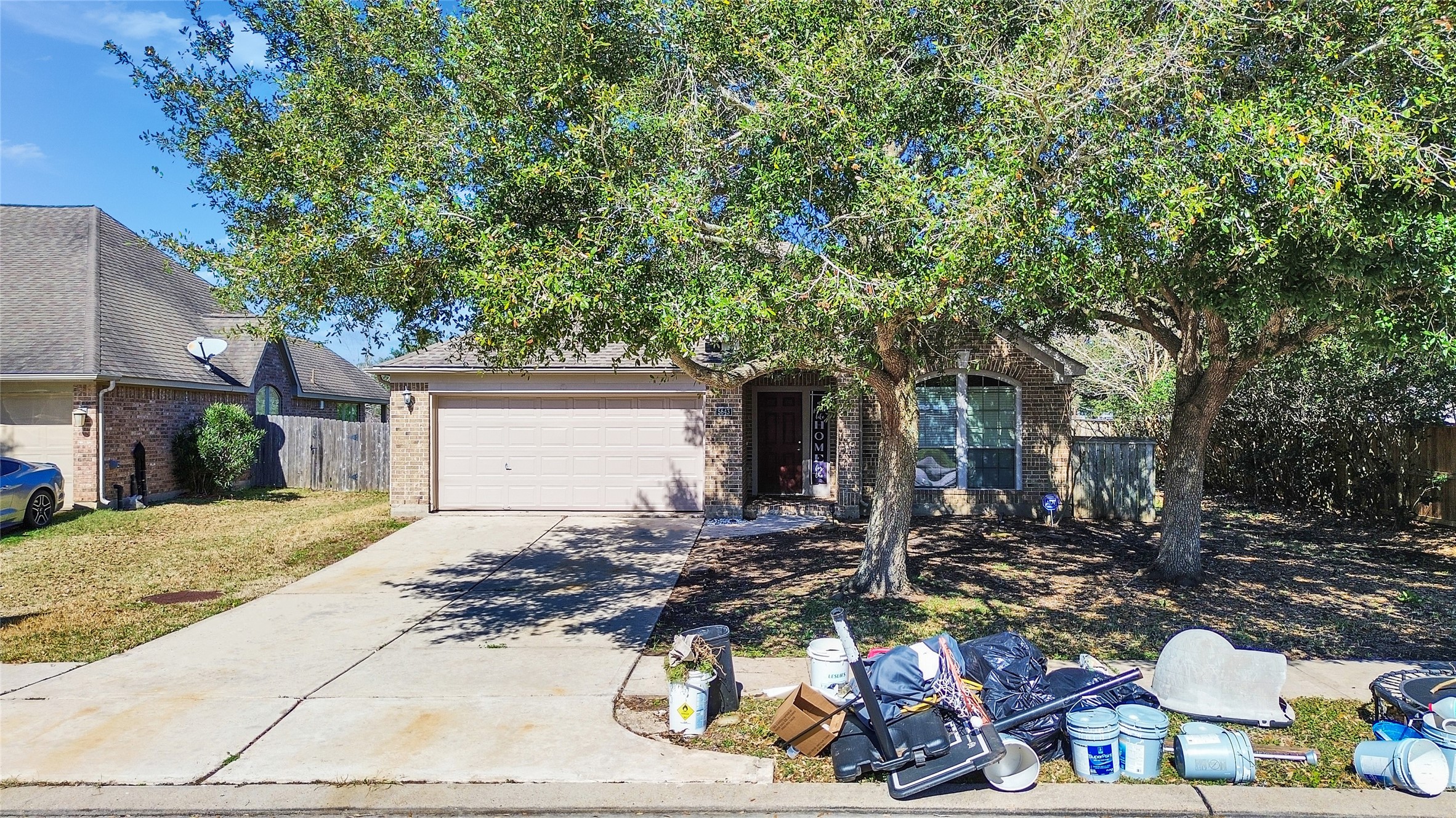 5643 Walnut Glen Lane Rosenberg, TX 77471 - Photo 5 of 42 a front view of a house with a yard