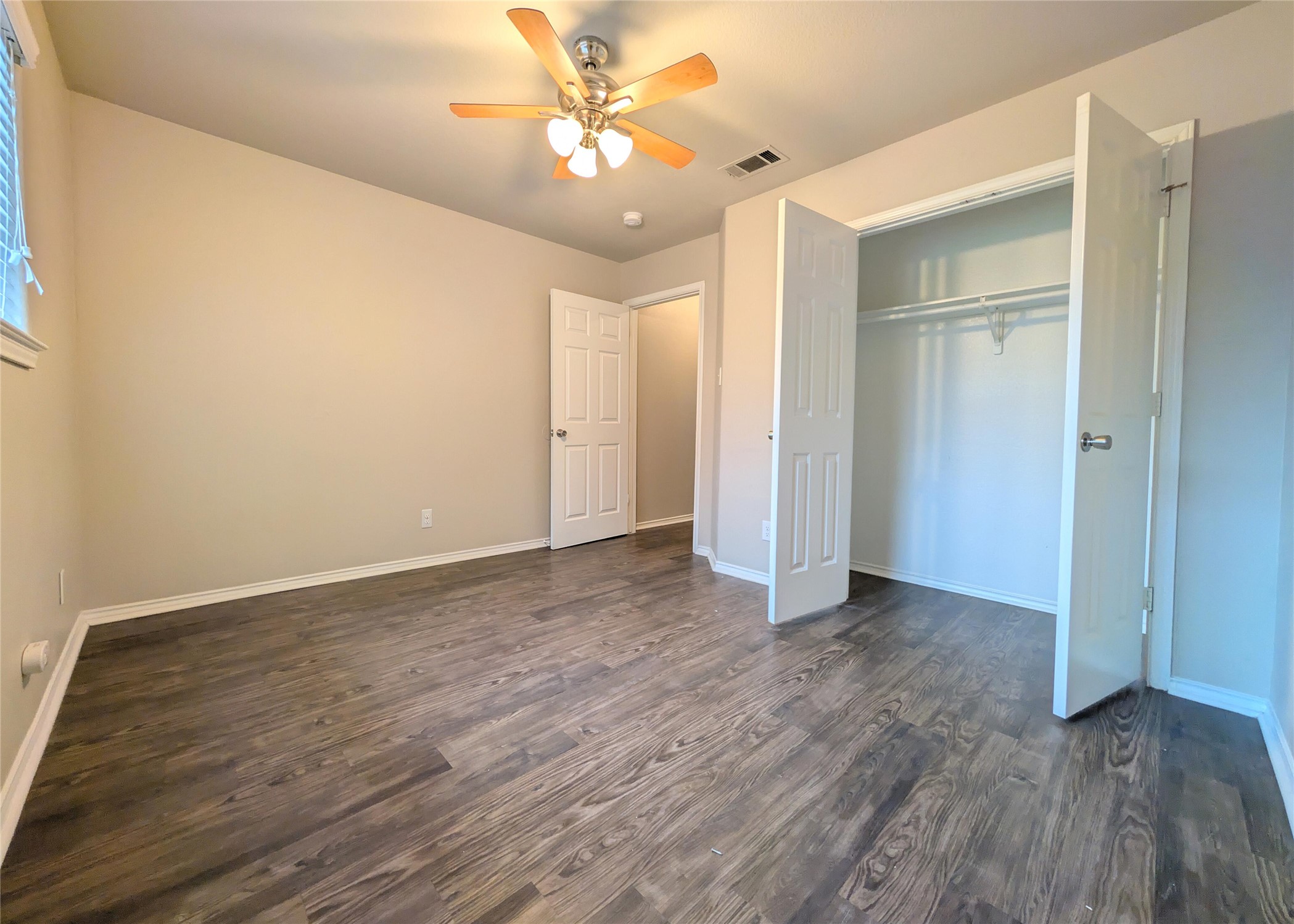 8816 Schick Road, Unit D Austin, TX 78729 - Photo 13 of 19 Bedroom 1 and closet