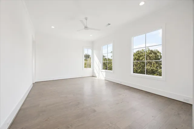 an empty room with windows