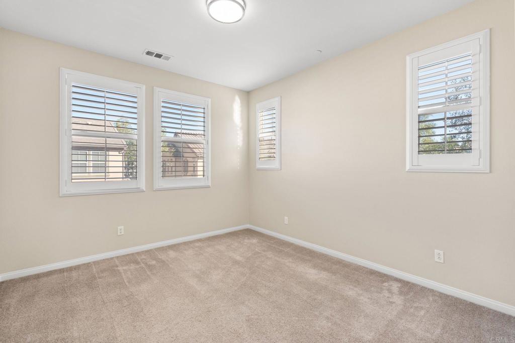 15968 Parkview Loop San Diego, CA 92127 - Photo 16 of 45 a view of an empty room with a window