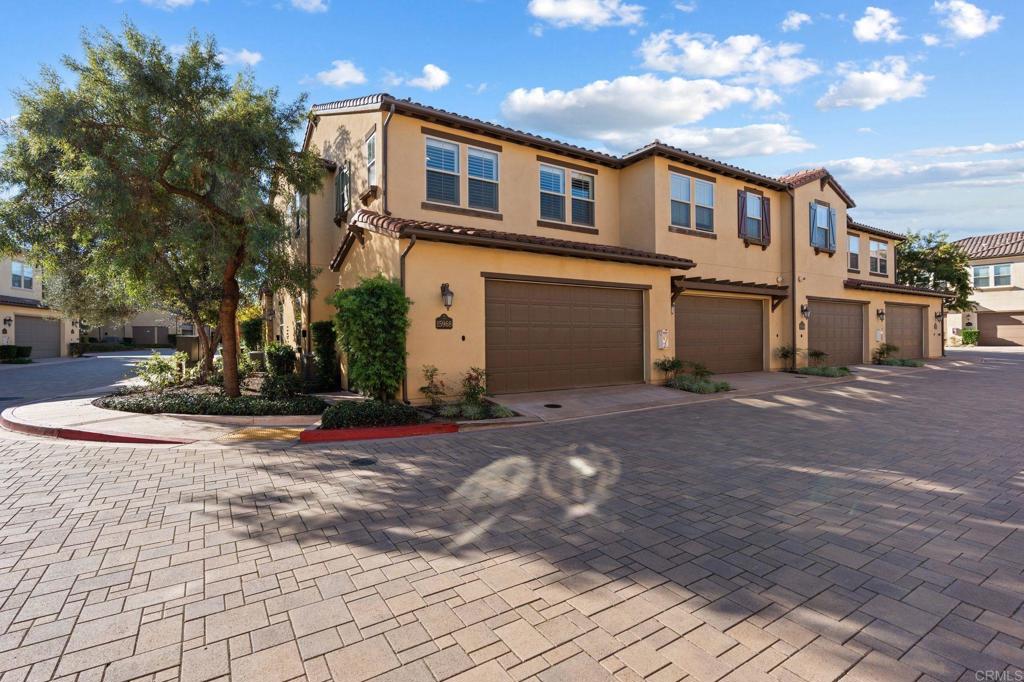15968 Parkview Loop San Diego, CA 92127 - Photo 26 of 45 a front view of a house with a yard
