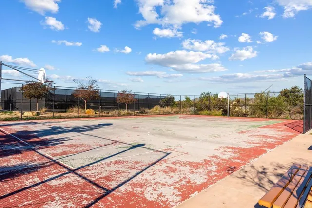 a view of a swimming pool with an outdoor space