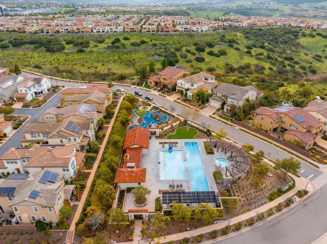 a view of swimming pool from a balcony