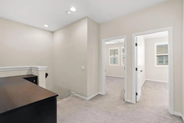 a view of a hallway to the house