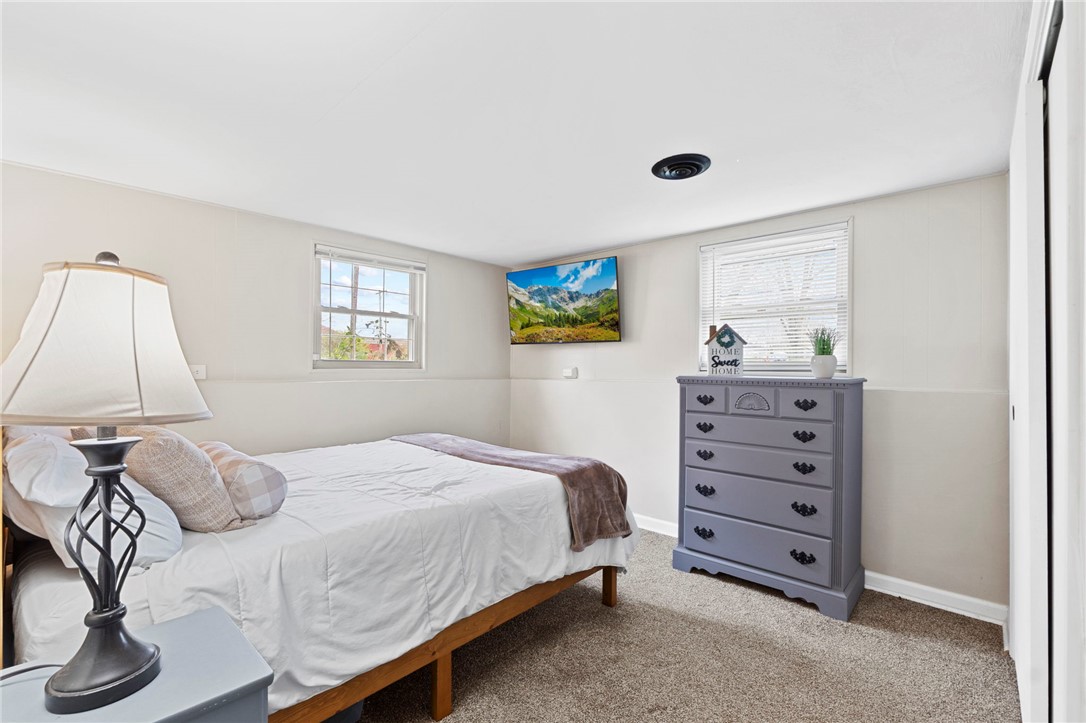 8180 Manning Road Germantown, OH 45327 - Photo 30 of 39 This cozy bedroom features plush carpeting and abundant natural light.