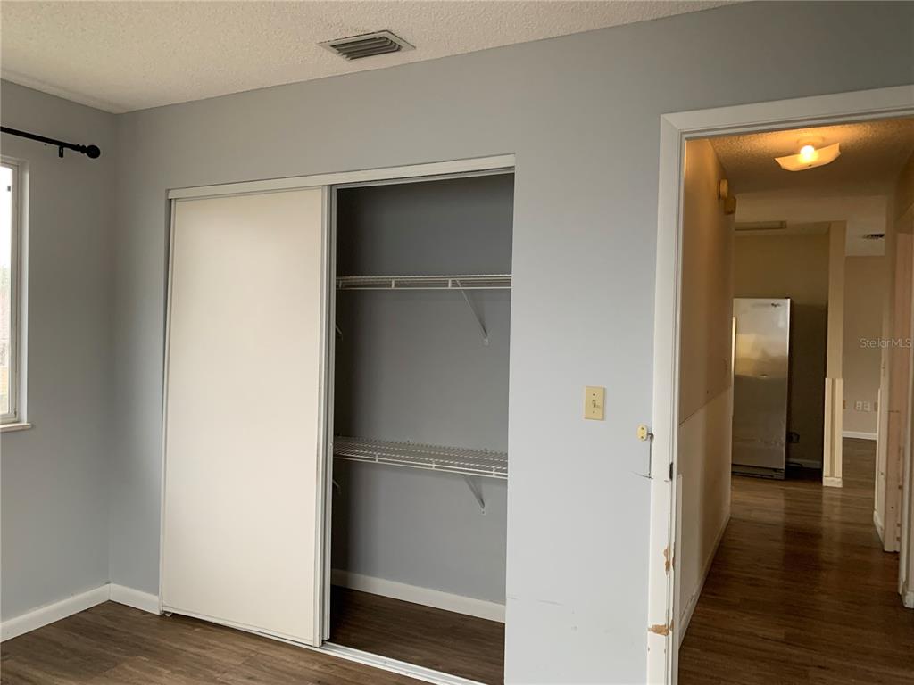 8431 Southwest 109th Lane Road Ocala, FL 34481 - Photo 17 of 20 a view of a room with wooden floor