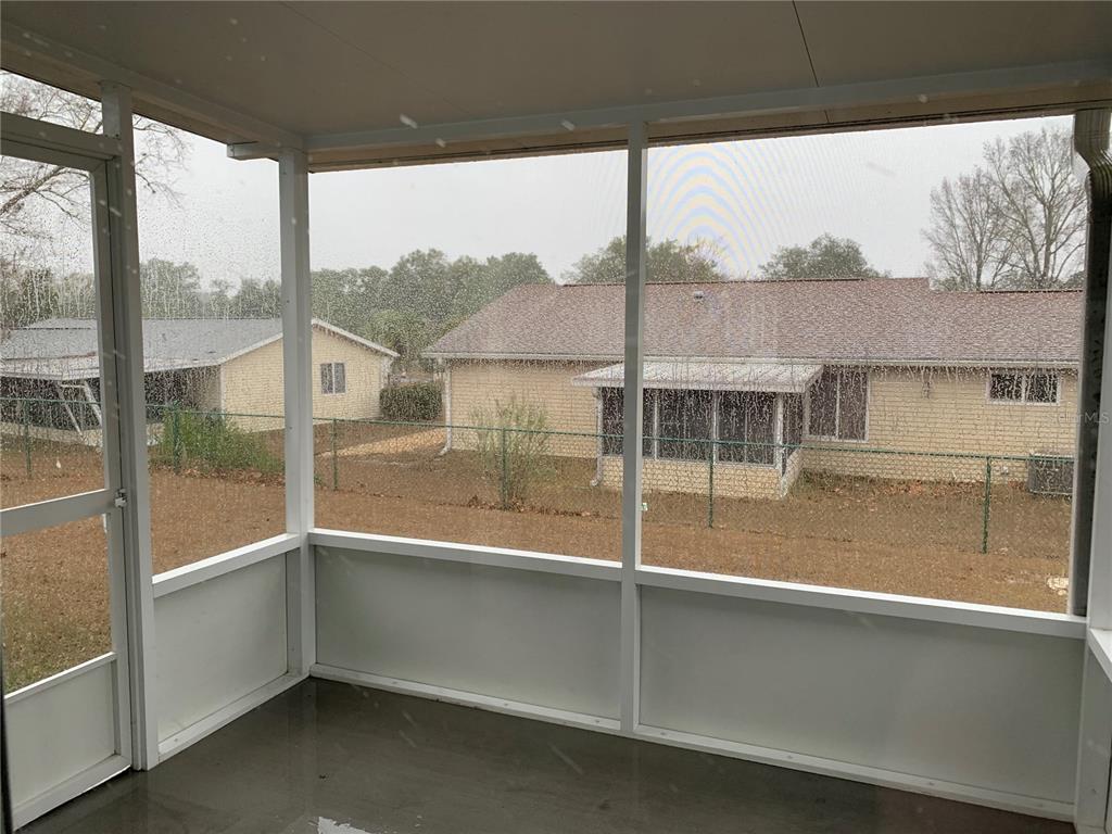 8431 Southwest 109th Lane Road Ocala, FL 34481 - Photo 18 of 20 a view of a balcony with yard