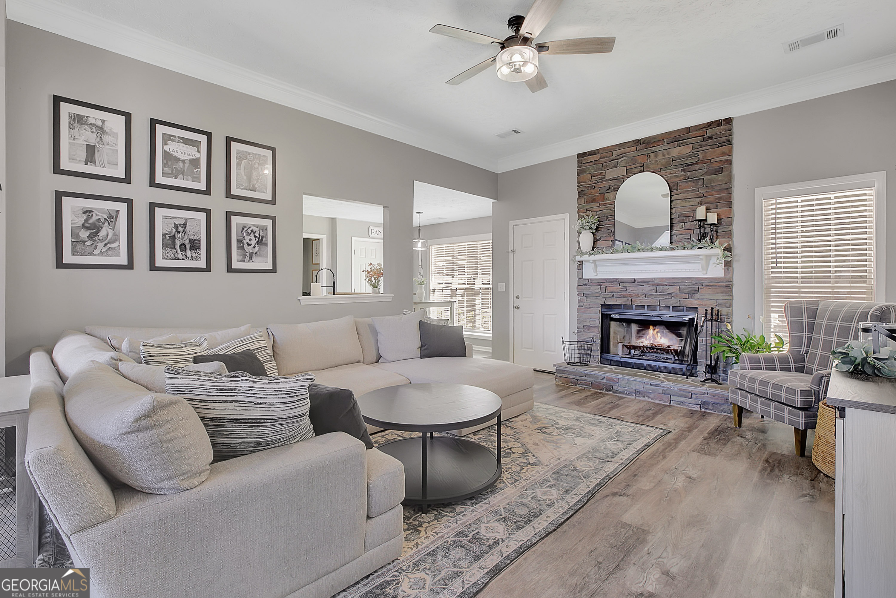 229 John Lovelace Road LaGrange, GA 30241 - Photo 19 of 59 a living room with furniture and a fireplace