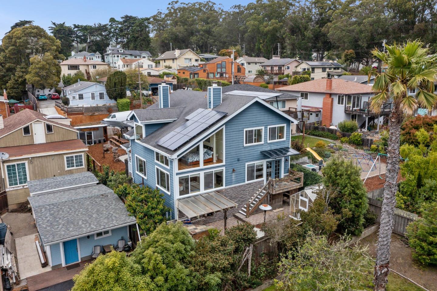 226 Palma Street El Granada, CA 94018 - Photo 3 of 41 a aerial view of multiple houses with a yard