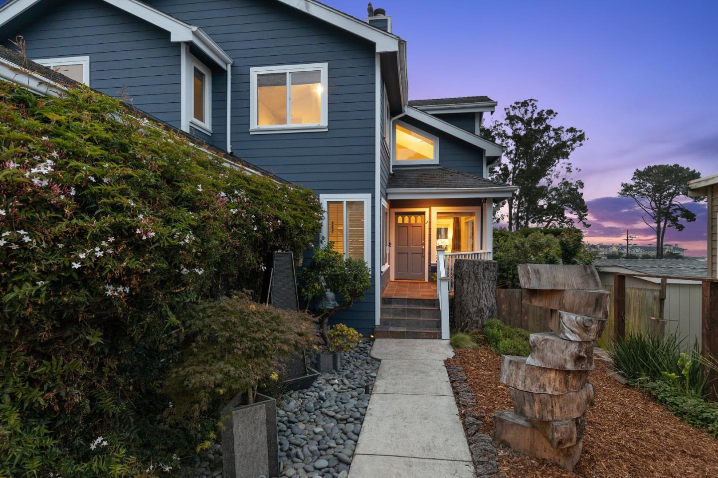 226 Palma Street El Granada, CA 94018 - Photo 7 of 41 a backyard of a house with lots of green space