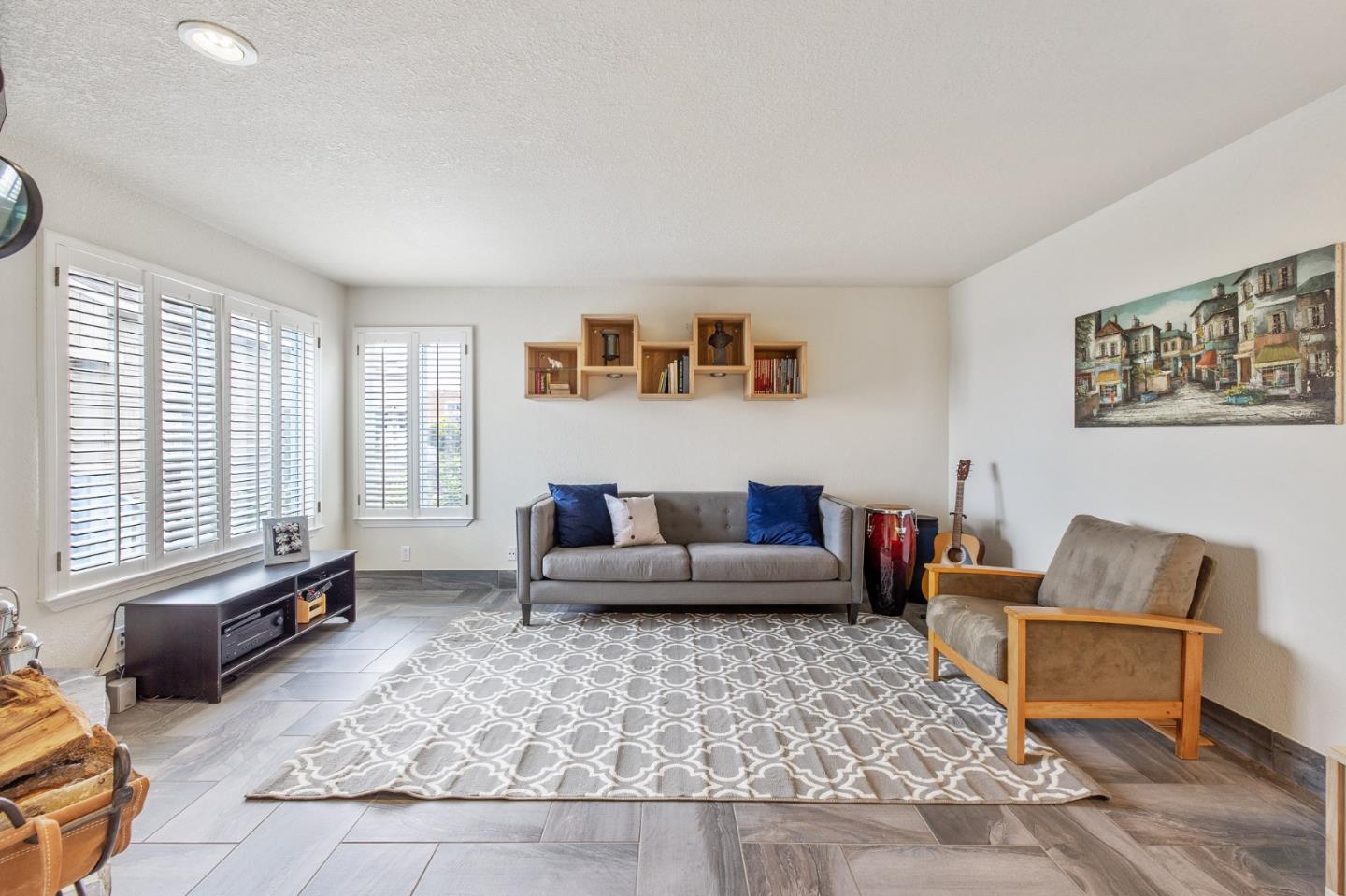 226 Palma Street El Granada, CA 94018 - Photo 9 of 41 a living room with furniture and a window