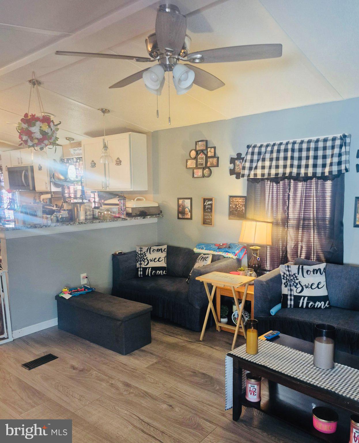 205 Robwood Road Dundalk, MD 21222 - Photo 5 of 14 Cozy living space with modern charm.