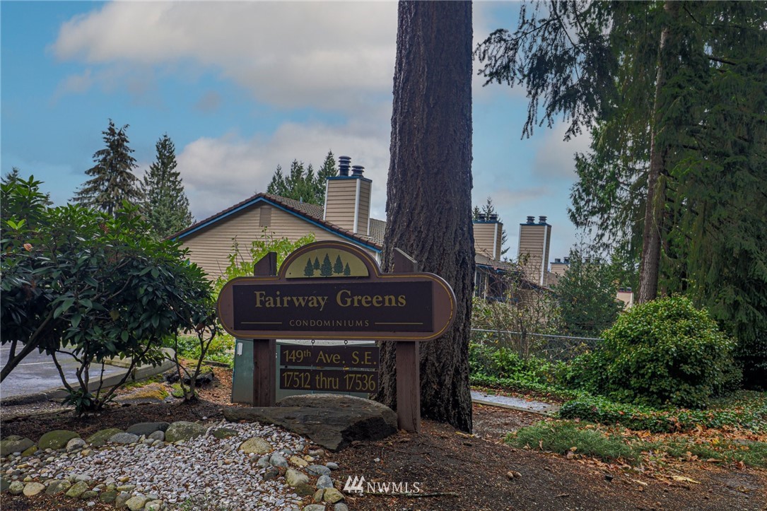 17518 149th Avenue Southeast, Unit 8 Renton, WA 98058 - Photo 25 of 25 a view of a chairs and table in the backyard