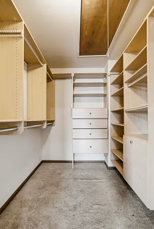 a view of an empty walk in closet