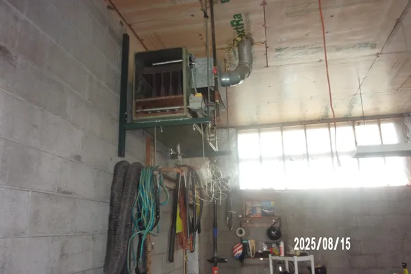 a picture of a bathroom with a shower