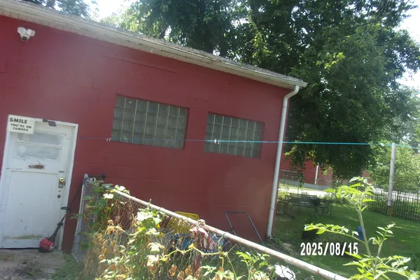 a backyard of a house with lots of green space