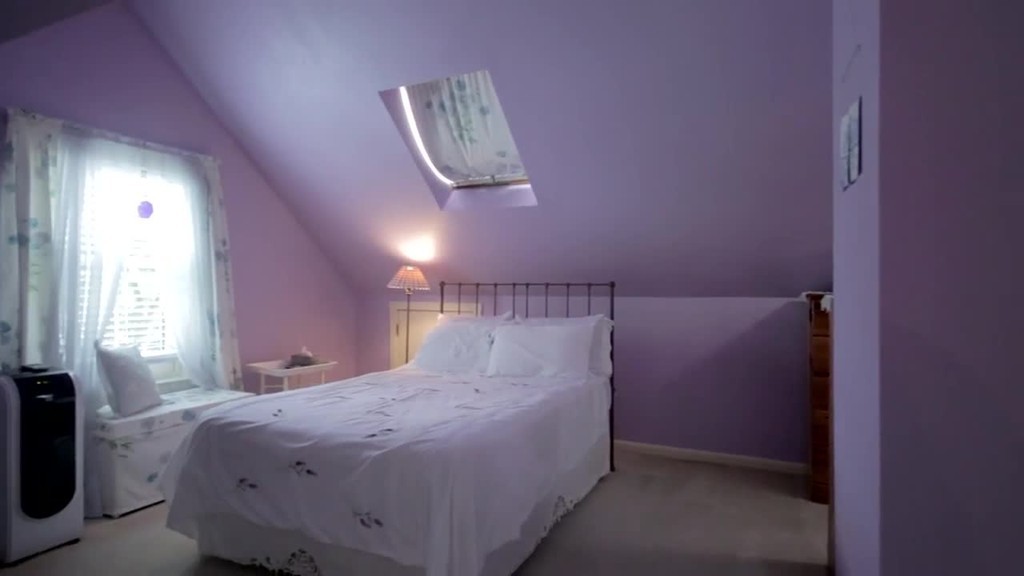 19 Sherman Street, Unit 2 Lexington, MA 02420 - Photo 11 of 15 a bedroom with a bed and window