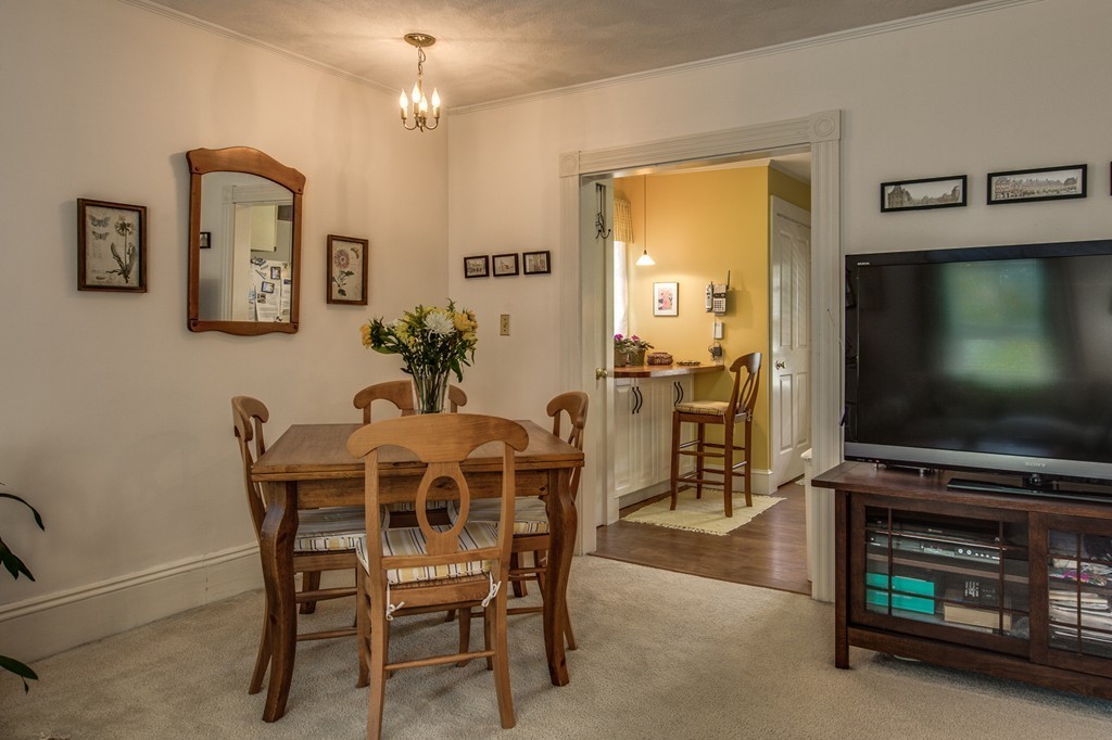19 Sherman Street, Unit 2 Lexington, MA 02420 - Photo 3 of 15 a dining room with furniture and window