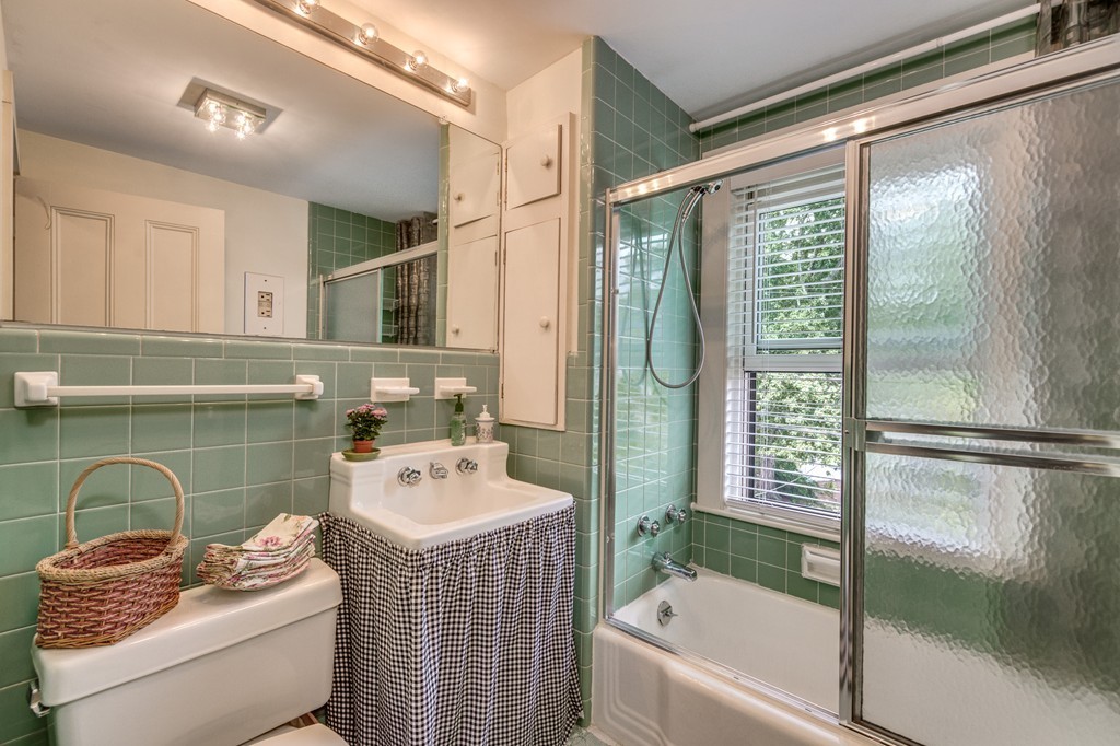 19 Sherman Street, Unit 2 Lexington, MA 02420 - Photo 9 of 15 a bathroom with a sink toilet and shower